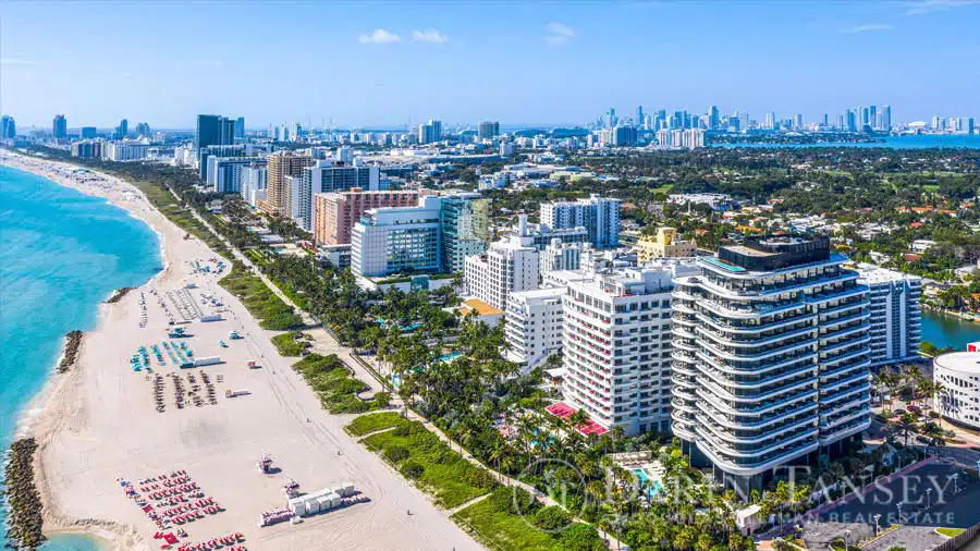 faena house's beautiful building aerial view by the beach