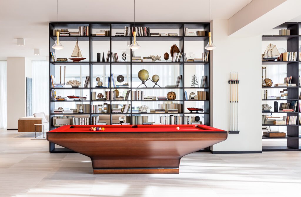 Club Room Pool Table 1 What distinguishes genuine luxury service from standard building amenities? The answer becomes clear when examining the comprehensive concierge offerings at Ritz-Carlton Residences Miami Beach—services that expose the limitations of conventional luxury living while demonstrating why authentic hospitality excellence cannot be replicated.