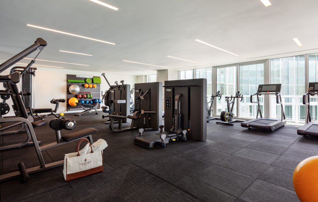 Fitness Center 1 What distinguishes genuine luxury service from standard building amenities? The answer becomes clear when examining the comprehensive concierge offerings at Ritz-Carlton Residences Miami Beach—services that expose the limitations of conventional luxury living while demonstrating why authentic hospitality excellence cannot be replicated.